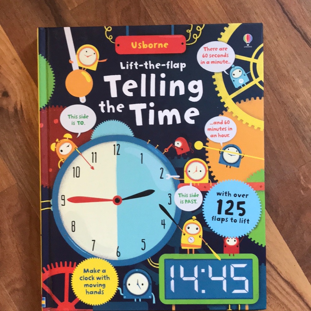 Usborne lift the flap Telling Time Book